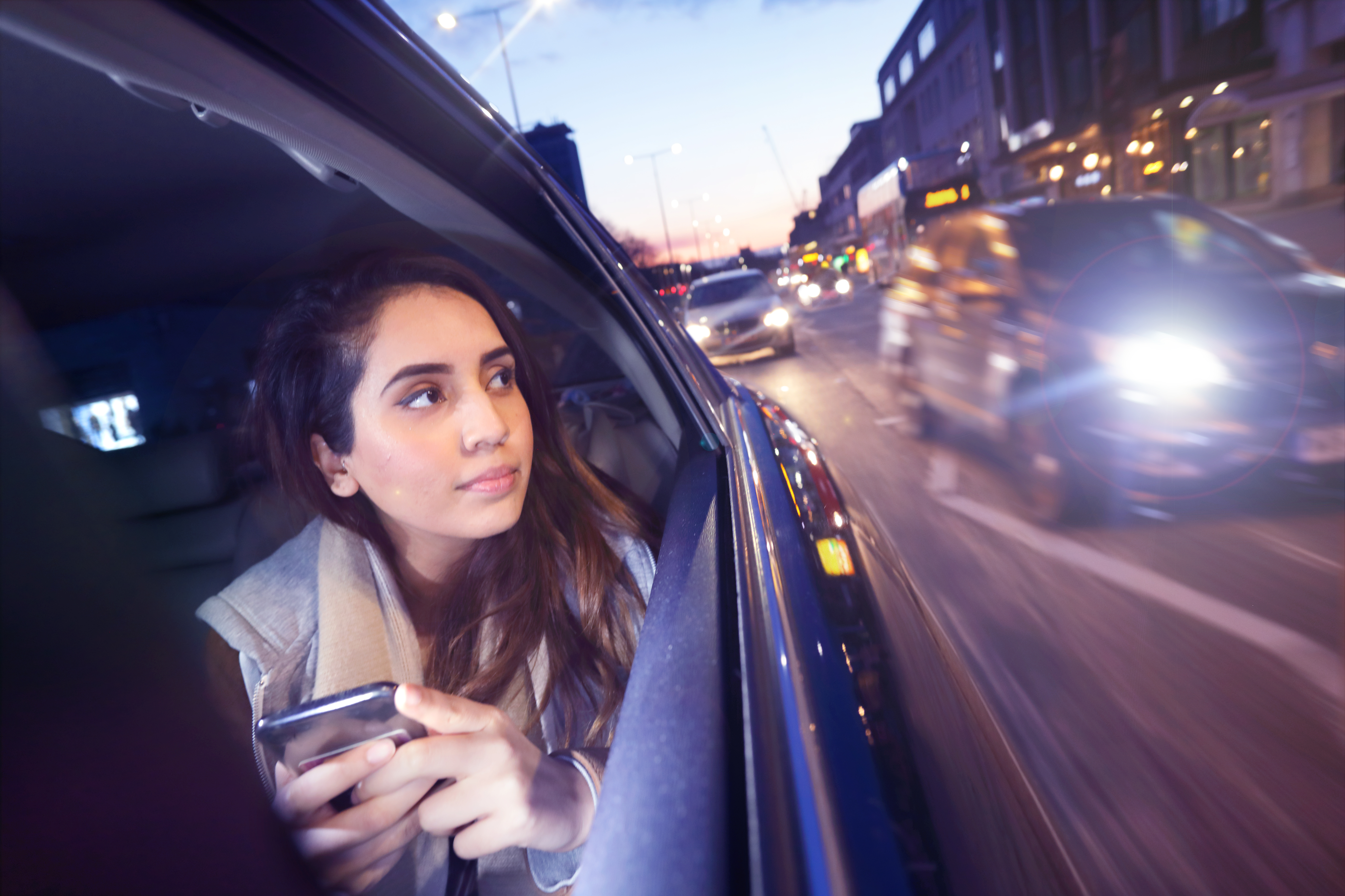 A woman looking out of a car window | Source: Getty Images