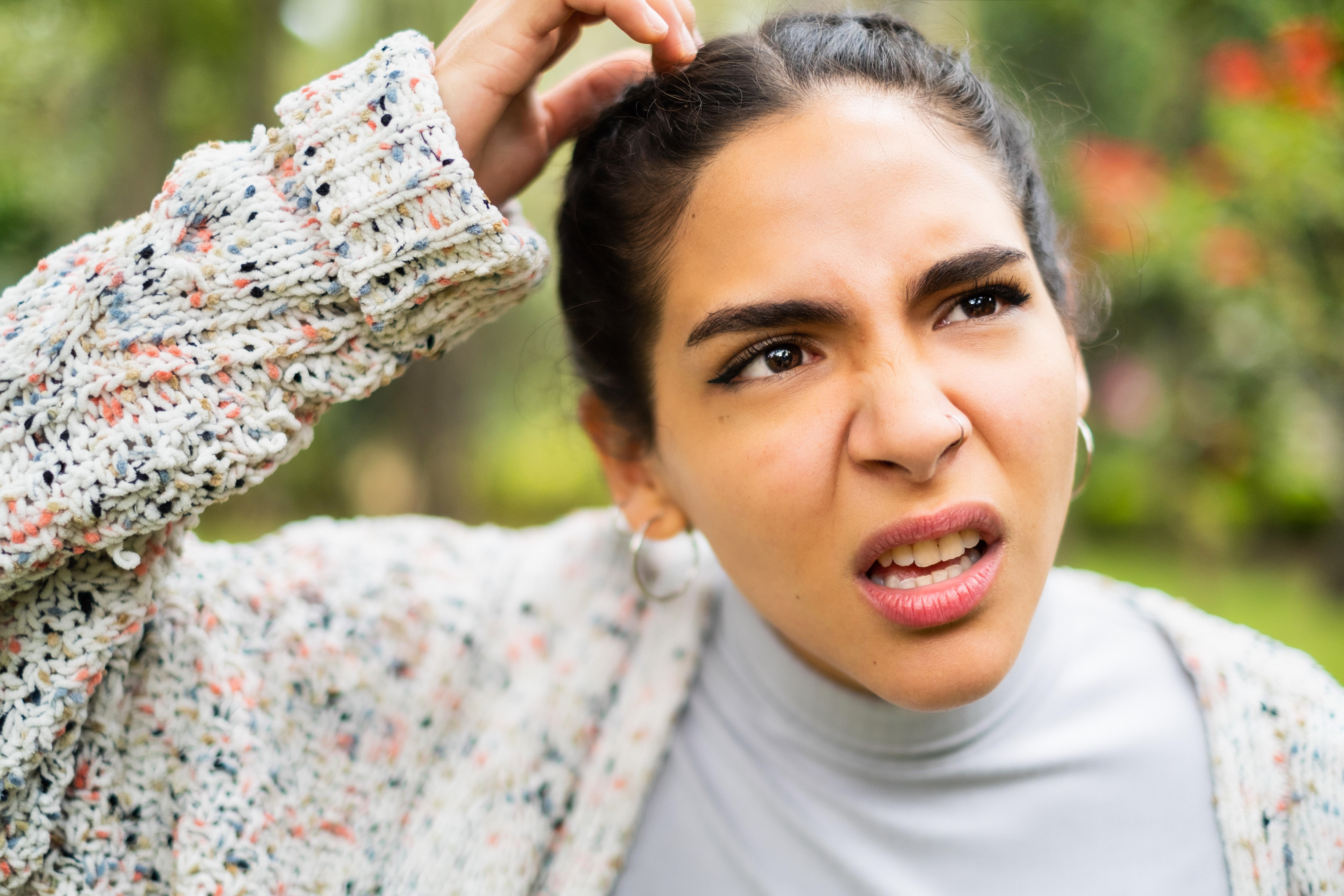 A confused and distressed woman | Source: Getty Images