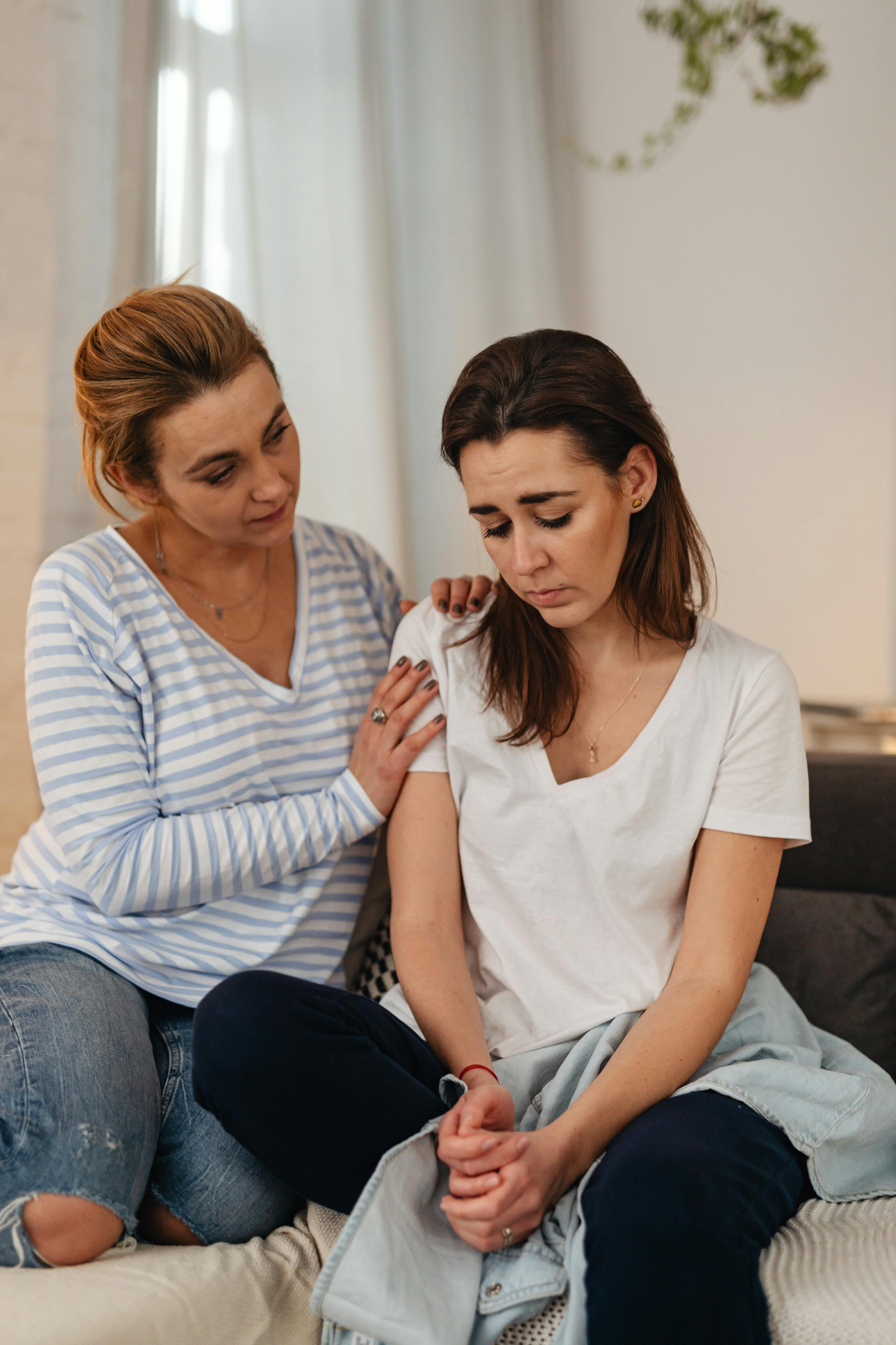 A mother comforting her daughter | Source: Pexels