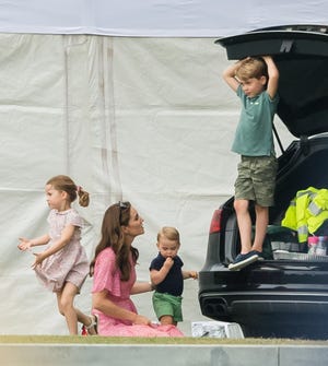 Princess Kate with her three children, Princess Charlotte, Prince Louis and Prince George, pictured in 2019. She is set to return to work after missing most of this year's public duties amid a private battle with undisclosed cancer.