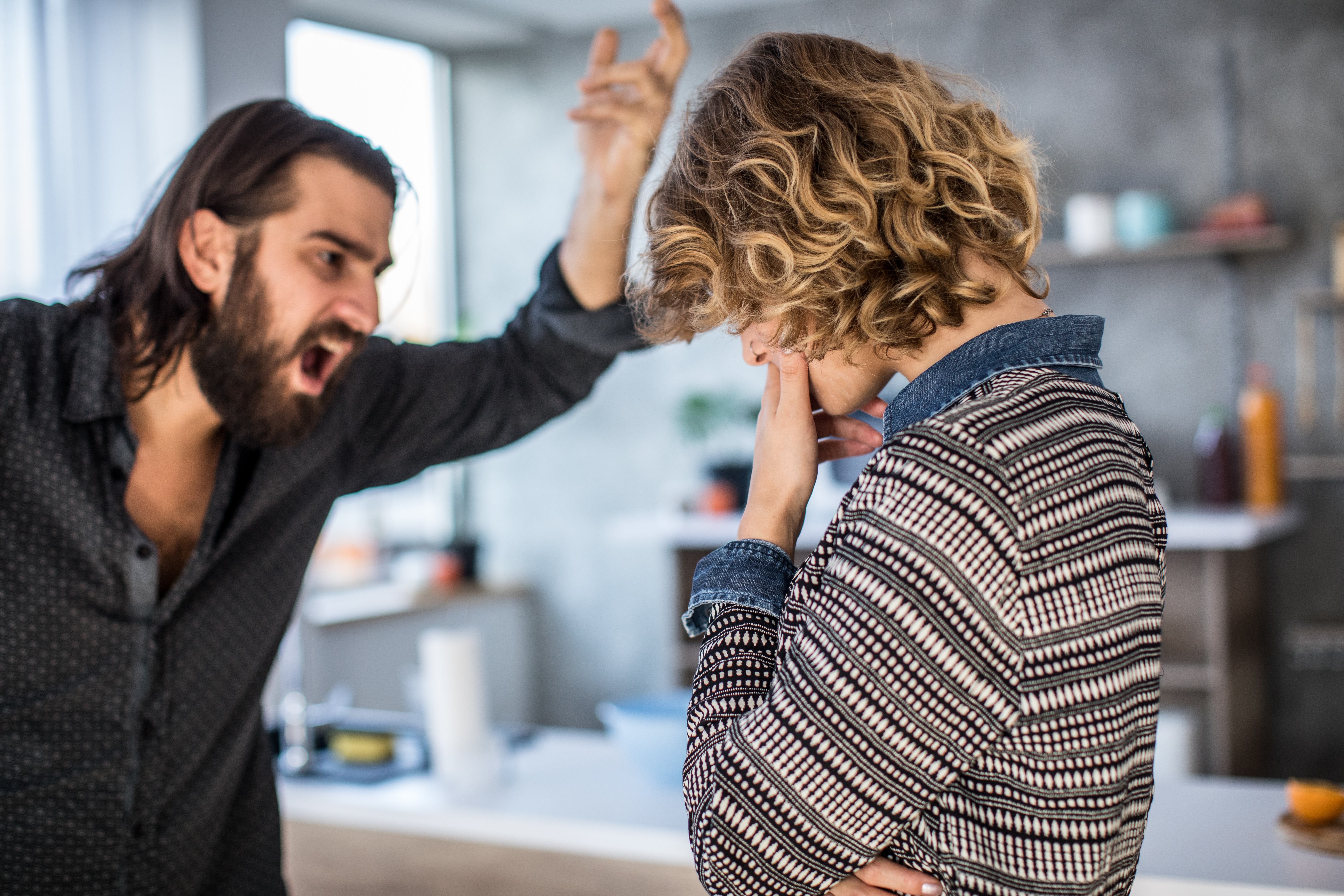 An angry man yelling at his wife | Source: Getty Images